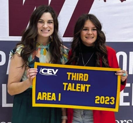 Heather Peters, right, an upcoming sophomore at Wellington High School, competes at the Area 1 FFA Convention by singing and placing third at the Area 1 Talent contest in Canyon.