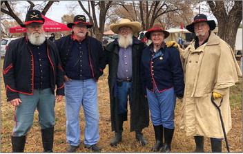 Rocky Sprott Second Living History Event organizer Darrell Colson, center, congratulates chili cookoff champion Barbara Jones, of Chandler, Okla. Jones accepted the $500 prize alongside the 1st Texas Artillery cannon group. Weatherly Roofing sponsored the cash award. Courtesy Photos