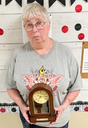With 30 years of service to Wellington Independent School District, Pat Needham garners a pendulum clock.