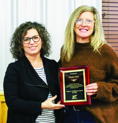 Childress District Traffic Safety Specialist Nicole Tyler, right, accepted the 2022 Vance L. “Huck” Castleberry award presented by Childress District Business Operations Manager Anita Thompson at the recent Childress District of the Texas Department of Transportation (TxDOT) Safety Banquet. Photo Courtesy of Childress District of TxDOT