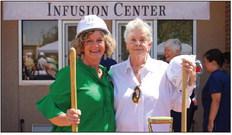 ChildressRegionalMedicalCenterCEOHollyHolcombandDiane Mashburn pause for a photo following the groundbreaking on the Charlie and Diane Mashburn Infusion Center.