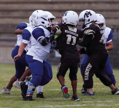In their third season, the Childress Youth Recreational League Lil Cats take on the Memphis Youth League Sandstorms Saturday, Oct. 8. Photos by Elizabeth Gamboa