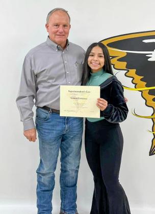 Memphis High School sophomore Narobi Espinoza accepts the Superintendent’s List designation from Memphis High School Principal Dick Hutcherson.