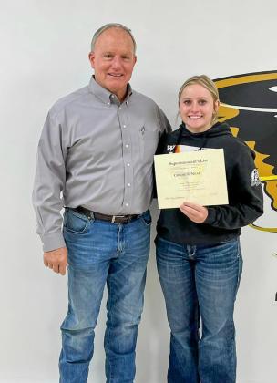 Memphis High School junior Chloie O’Neal accepts the Superintendent’s List designation from Memphis High School Principal Dick Hutcherson.