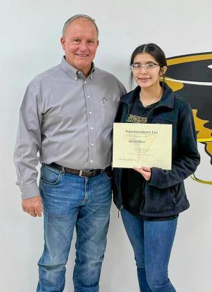Memphis High School freshman Alexis Diaz accepts the Superintendent’s List designation from Memphis High School Principal Dick Hutcherson.