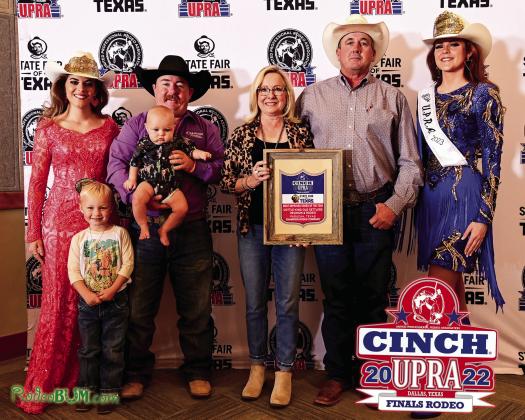Cottle-King Old Settlers Reunion and Rodeo President Dana Wright and Rodeo Director Frank Wright accept Most Improved Rodeo of the Year by the United Professional Rodeo Association (UPRA) during the UPRA Finals Rodeo and Awards held Saturday, Oct. 22 the State Fair of Texas in Dallas. From left, 2022 Miss UPRA Ashlyn Williams, Champion Rodeo Company stock contractor National “Nate” Champion along with sons Reinen and Ropen, Dana Wright, Frank Wright, 2023 Miss UPRA Aspen Wash. Courtesy Photo