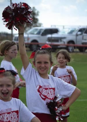 Skyrocket mini cheer campers shout football victory vibes