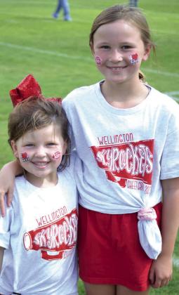 Skyrocket mini cheer campers shout football victory vibes