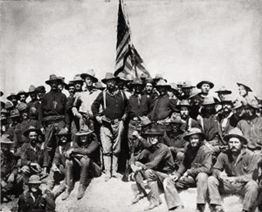In July 1898, Teddy Roosevelt, center, and his Rough Riders in Santiago, Cuba fight in the Spanish-American War.