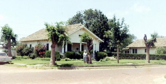 Grandma Baldwin pauses in front of her El Paso St. home in Wellington.