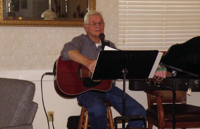 Joe Robinson sings Christmas carols and popular holiday songs at the Christmas party, hosted by Rothwell Circle of United Women in Faith of Childress Methodist Church, at Cottage Village Assisted Living and Retirement Center. Robinson also led sing-alongs, including “Frosty the Snowman” and “Jingle Bells.”
