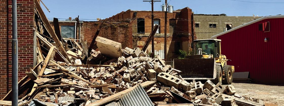 Demolition of 130 Commerce St., which began Tuesday, May 16, continues. The demolition, awarded to AAJ Concrete, of Plainview, will total $87,000. The property, which belongs to the Childress Fire Department, was deemed hazardous to the public in 2022. The Red River Sun/Elizabeth Tanner