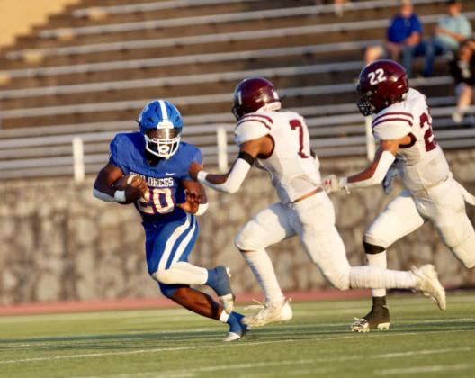 Childress running back Da’Reon Mathis looks for room against the Abernathy Antelopes in a season opener Friday, Aug. 25 at Fair Park Stadium in Childress. Press Pass Sports/Nicole Dill
