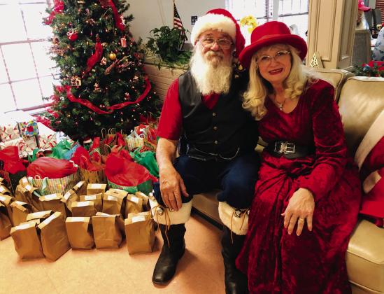 Santa and Mrs.Claus visit Wellington Care Center