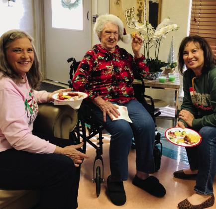 Santa and Mrs.Claus visit Wellington Care Center
