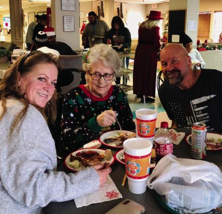 Santa and Mrs.Claus visit Wellington Care Center