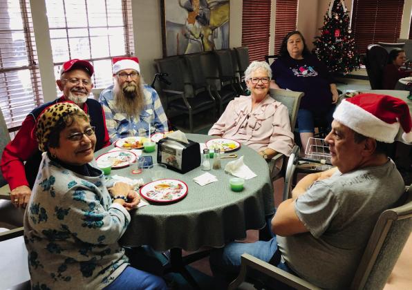 Santa and Mrs.Claus visit Wellington Care Center