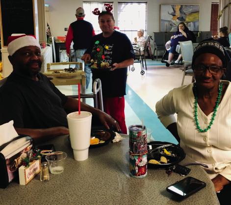 Santa and Mrs.Claus visit Wellington Care Center