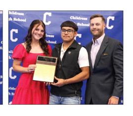 Brinley Stone, left, and Jaden Rodriguez, center, are awarded Bobcat and Lady Cat Powerlifting Most Valuable Player, presented by head powerlifting coach Matthew Olson.