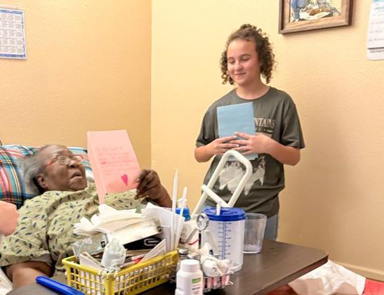 Memphis High School Family, Career and Community Leaders of America (FCCLA) members Delilah Perez and Emery Warren partner with Memphis Middle School theater arts students to deliver “Notes of Kindness” to Memphis Convalescent Center residents. “We are so grateful to the Memphis Independent School District students’ dedication to our residents,” Memphis Convalescent Center Administrator Myrna Robinson said. “The love and smiles you bring are precious.” Memphis ISD