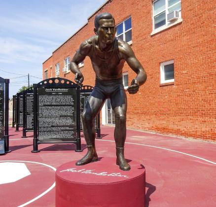 A statue of Jack VanBebber stands in the downtown area of his hometown, Perry, Okla.