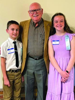 Monson Music Studio students Carter Keys, left, and Jentry Souder, right, compete in the Wichita Falls Spring Music Festival Saturday, March 4 at Midwestern State University. The students are coached by Gerald Monson, center, owner of Monson Music Studio. Courtesy Photo