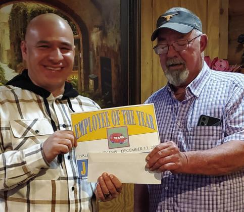 Hall County Emergency Medical Services’ (EMS) Nick Narvaez is awarded Employee of the Year, presented by Hall County EMS Director Jace Francis, Saturday, Dec. 14 during Hall County EMS’ Christmas party. Photos Courtesy of Hall County EMS