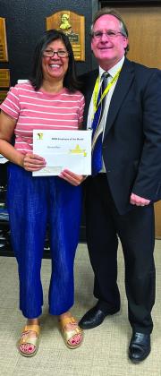 Austin Elementary School’s Norma Ross is the Memphis Independent School District (ISD) Teacher of the Month. Ross is awarded by Memphis ISD Superintendent William Alexander.
