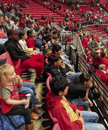 Photo Courtesy of Memphis ISD Guns up! Memphis Middle School Whirlwind basketball teams attend the recent Texas Tech Red Raiders vs. Houston Christian Huskies basketball game Wednesday, Dec. 21 at United Supermarkets Arena in Lubbock.