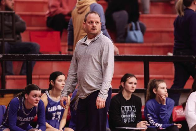 Childress Head Coach Shannon Fisher watches the action during a non-district game against Tascosa.