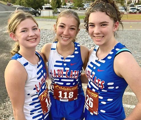 Childress Lady Cats Piper Timmons, Claire Davis and Libby Sanford compete at the 2026 Jeep Webb Classic Saturday, Sept. 5, in Borger. CHILDRESS BOBCAT BOOSTERS