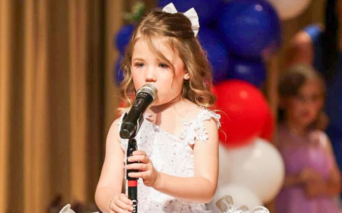 Area youth, including 2026 Miss All American Adlee Lambert, of Childress, compete for the Miss All American crown Thursday, July 2 at the Childress Junior High School Auditorium. THROUGH THE LENS OF LIZ