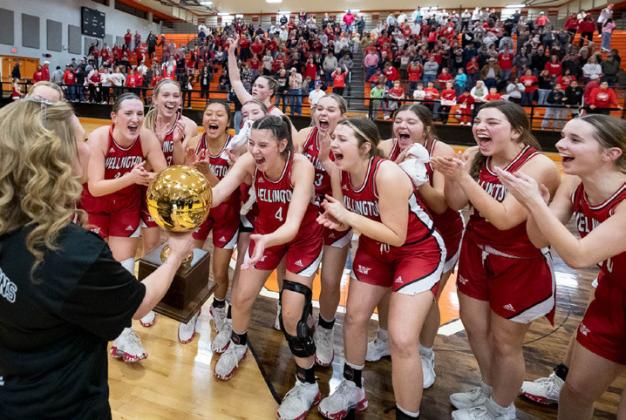 The Wellington Lady Rockets celebrate with the Class 2 area round gold ball after beating Panhandle 41-38 on Friday night, Feb. 16 at the Caprock Activity Center. Press Pass Sports/Joe Garcia III