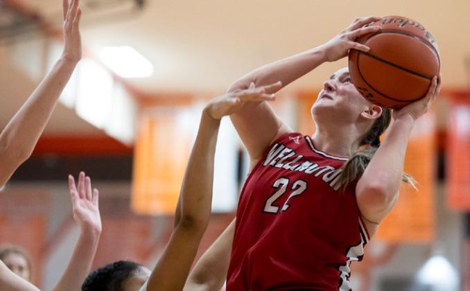 Wellington’s Audrey Jones goes up for a bucket against Panhandle on Friday night, Feb. 16, leading the scoring with 21 points. Others scoring were Charley Wilbur with 10 points, Briley Waters with four, Kaitlin Bawcom with three, Presley Kane with two and Leslie Orozco with one point. Press Pass Sports/Joe Garcia III