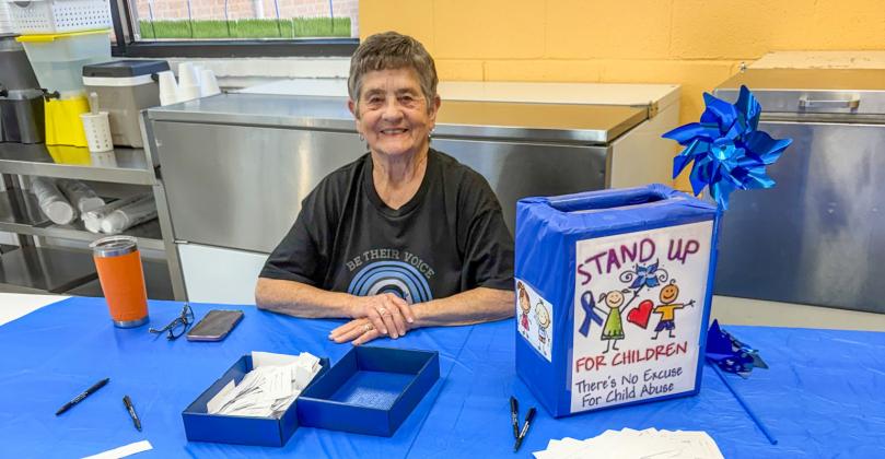 Saunna Blacksher, a longtime member of Collingsworth County Child Welfare Board, supporting Child Protective Services (CPS), registers parents during the annual “Eat Lunch with Your Child” event on Thursday, April 2 at the Wellington Elementary School cafeteria. Parents eating with their child entered their name in a drawing for gift cards to area restaurants and Market Square Supermarkets. Watch for winners in next week’s edition of The Red River Sun.