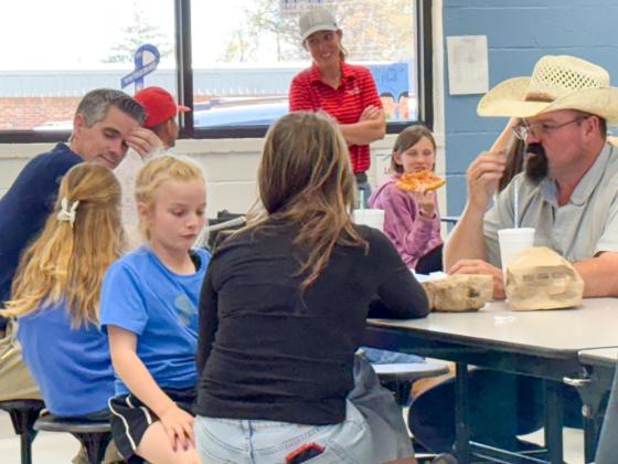 Parents crowd into the Wellington Elementary School cafeteria for the Thursday, April 2 “Each Lunch with Your Child” campaign to publicize Child Abuse Prevention Awareness during the month of April.