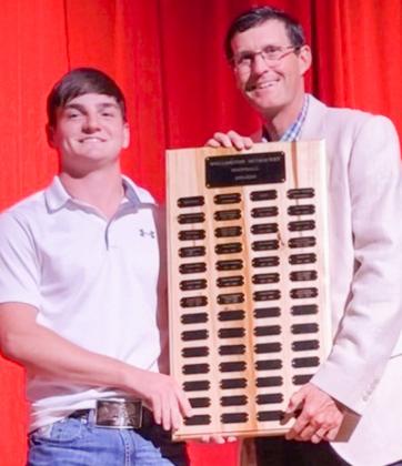 Wellington High School junior Connor Bowen receives the Football Defensive Linebacker Award, presented by Athletic Director Greg Proffitt.