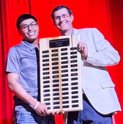 Wellington High School senior Yobani Moreno earns the Football Outstanding Lineman Award, presented by Athletic Director Greg Proffitt. SHAUNA SALINAS/THE GREENBELT INTREPID