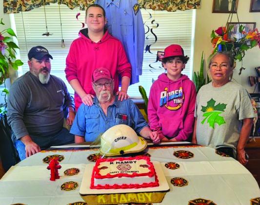 Surrounded by his family, Kevin Hamby, center, celebrates his retirement from the Wellington Volunteer Fire Department, where he served for 38 years. Through the years serving his community, Hamby took on the role of fire chief. His most memorable moment is when the fire station burned in 1995. From left: Hamby’s son, Jonathan Hamby; grandsons Tristan Hamby and Jeremiah Hamby; and Hamby’s wife, Eva Hamby. Courtesy Photo