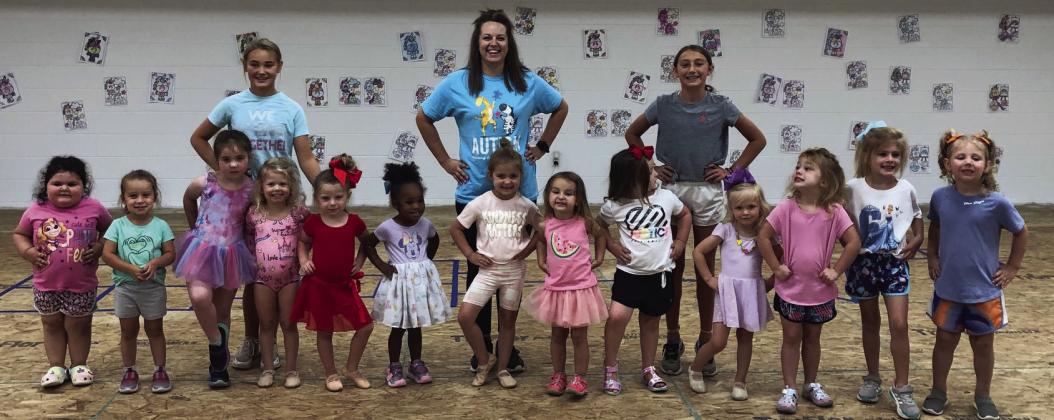 Kacy Cabbell’s Summer Dance Camp participants in the three- and four-year-old morning session pause between dances during the weeklong camp Thursday, June 8. Front row, from left: Baylee Rodriguez, Gentry Nevarez, Avery Bell, Kellyn Conner, Gia O’Rear, Emmi Conley, Whitley Souder, Zella McDaniel, Laura Lynn Hommel, Monroe Allred, Maddi Hightower, Emma Hightower, Evvy Kaas Kinney. Back row, from left: Ava Kate Inman, Kacy Cabbell, Claire Kane. Not pictured: Blake Lemons. The Red River Sun/Bev Odom