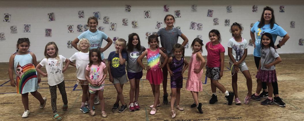Five-year-old and up students in Kacy Cabbell’s afternoon Summer Dance Camp session take a break from their choreographed dance routine Thursday, June 8. Front row, from left: Sherree Ballinger, Kylie Wiebe, Charleigh Henard, Tinlee Cabbell, Harlow Stratton, Kodi Cabbell, Jenna Faullks, Adeline Faulks, Harper Cox, Summer Valles, Alaeja Archie, Vivyan Valles. Back row, from left: Ava Kate Inman, Claire Kane and Kacy Cabbell.