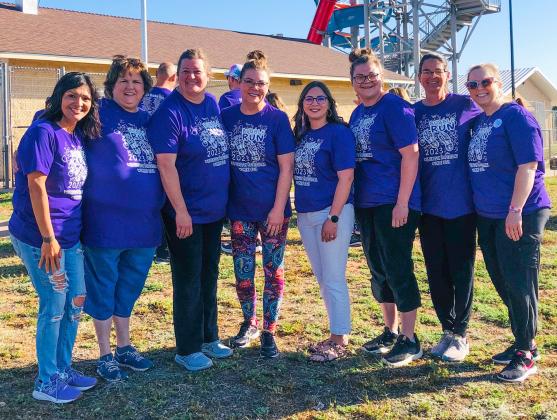 Wellington Professional Women (WPW) conduct the 2023 Bubble Run and raise over $10,000 for Hearts United Give Support (HUGS), the local cancer support organization. From left: Becky Reyes, Candy Powell, Carrie Martinez, Linda Duke, Cassandra Schuler, Holly Statham, Becky Lampe, Natasha Mixon. The Red River Sun/Bev Odom