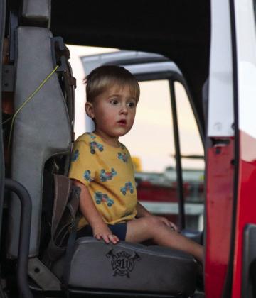 Community members attend National Night Out, an annual community-building campaign focused on enhancing the relationship between neighbors and law enforcement, Tuesday, Oct. 10 at Fair Park Stadium. Through the Lens of Liz/Elizabeth Oronia