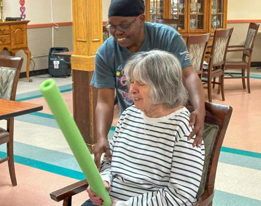 Memphis Convalescent Center residents play noodle ball Saturday, Feb. 17. Played with a balloon and pool noodles, residents took a “whack” at the game, which involved hitting the balloon back and forth using the pool noodles. Photos Courtesy of Memphis Convalescent Center