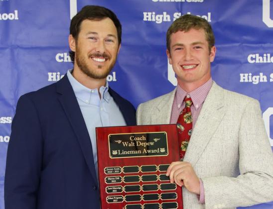 Cutter Bruce receives the Coach Walt Depew Lineman Award, presented by Offensive Coordinator Reid Ware.