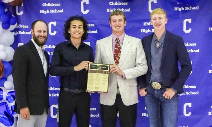 Afton Tipa receives the Bobcat Tennis Singles Most Valuable Player (MVP) Award and Cutter Bruce and Sterling Bruce receive the Bobcat Tennis Doubles MVP Award, presented by Athletic Director Bo Helm. From left: Helm, Tipa, C. Bruce, S. Bruce.