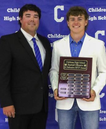 Brody Hightower receives the Bobcat Baseball Defensive Most Valuable Player Award, presented by Bobcat Head Baseball Coach Trent Mayden.