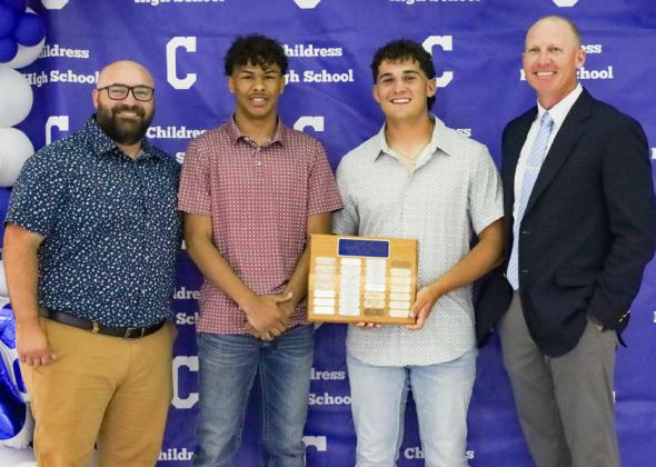 Jaden Walker receives the Bobcat Track Most Valuable Player Award, and Colton Teichelman receives the Bobcat Field Most Valuable Player Award, presented by Coaches Lee Brandon and Kolby Pool. From left: Pool, Walker, Teichelman, Brandon.