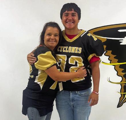 Senior Noah Lopez swaps with Carla Murphy.