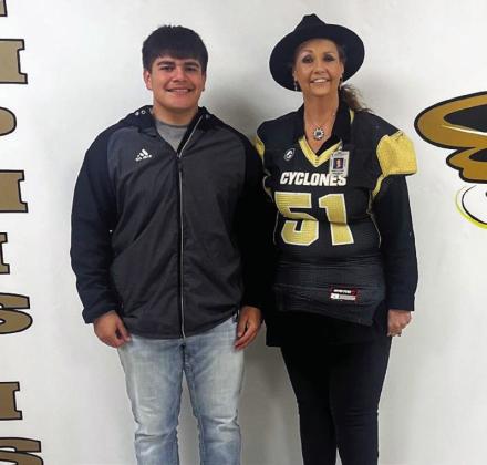 Senior Austin Valle swapes with Wendy Altman.